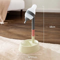 Green adjustable standing water dispenser for pets with a detachable pole and separate bowl.