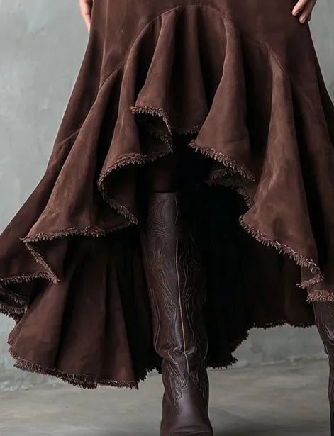 Western brown women's maxi skirt with high-low hem and ruffle trim on eco suede polyester fabric.