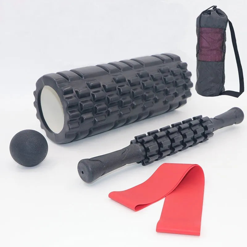 33cm black fitness foam roller massage stick on a plain background.