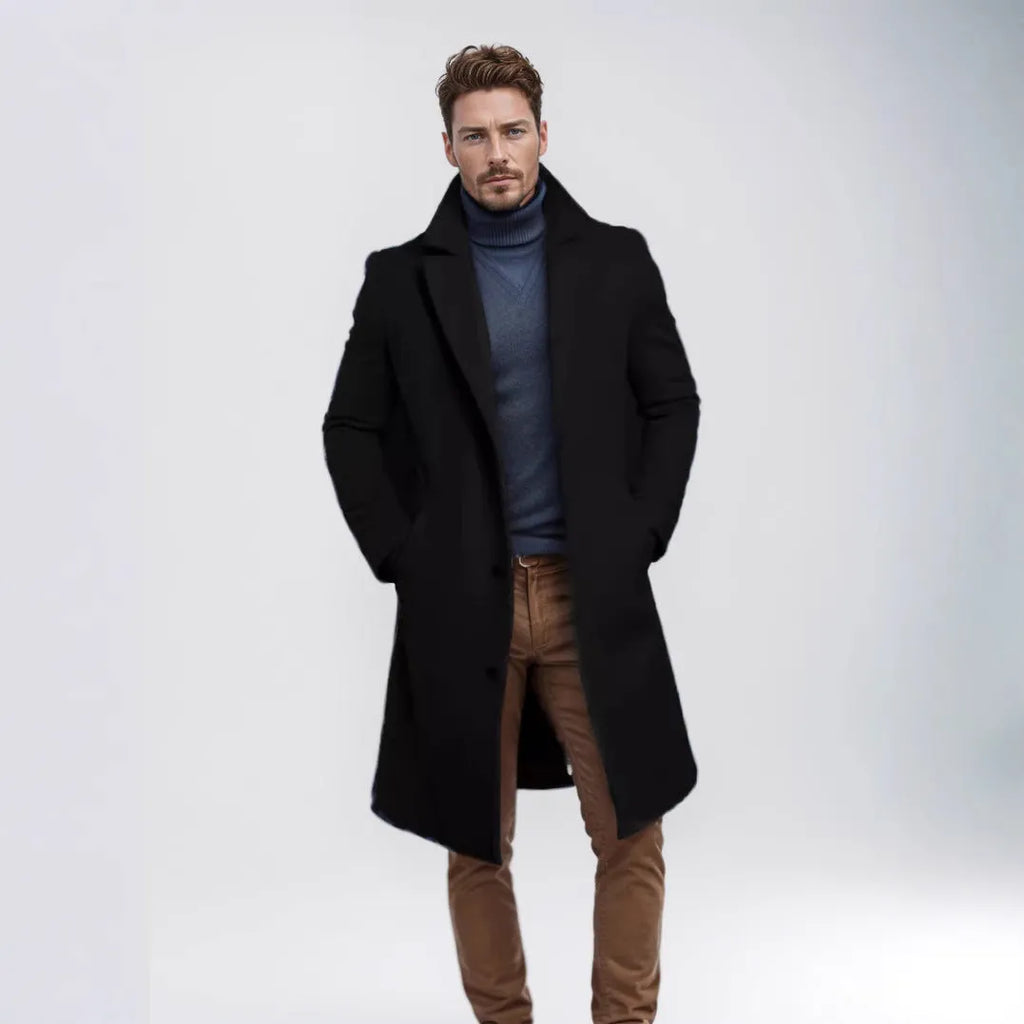 Men's mid-length solid colour woolen coat in dark gray, side view, showing thick fabric and side seam pocket.