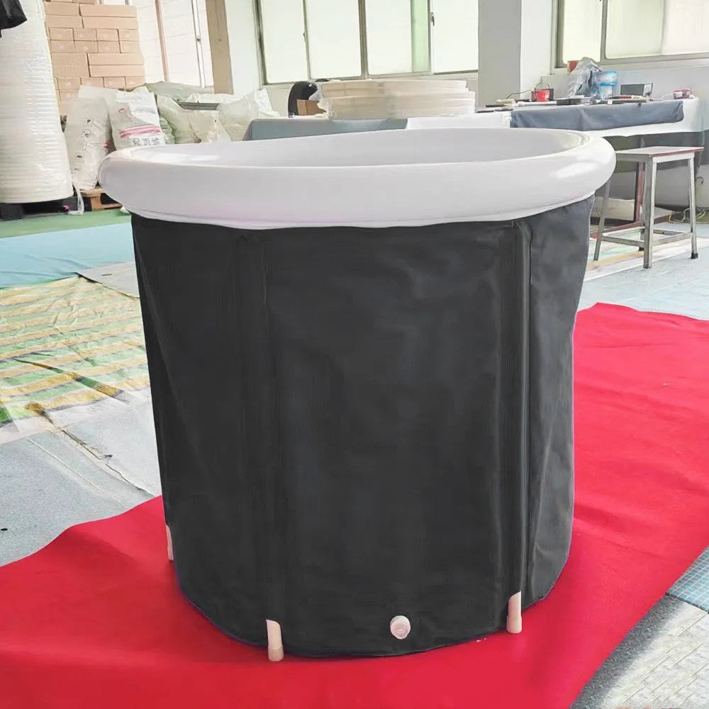 Black portable inflatable ice bath tub measuring 70x80cm with weather lid and drainage components