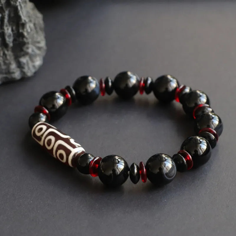 Hand-woven black agate and chalcedony dzi bead bracelet with 11mm geometry beads
