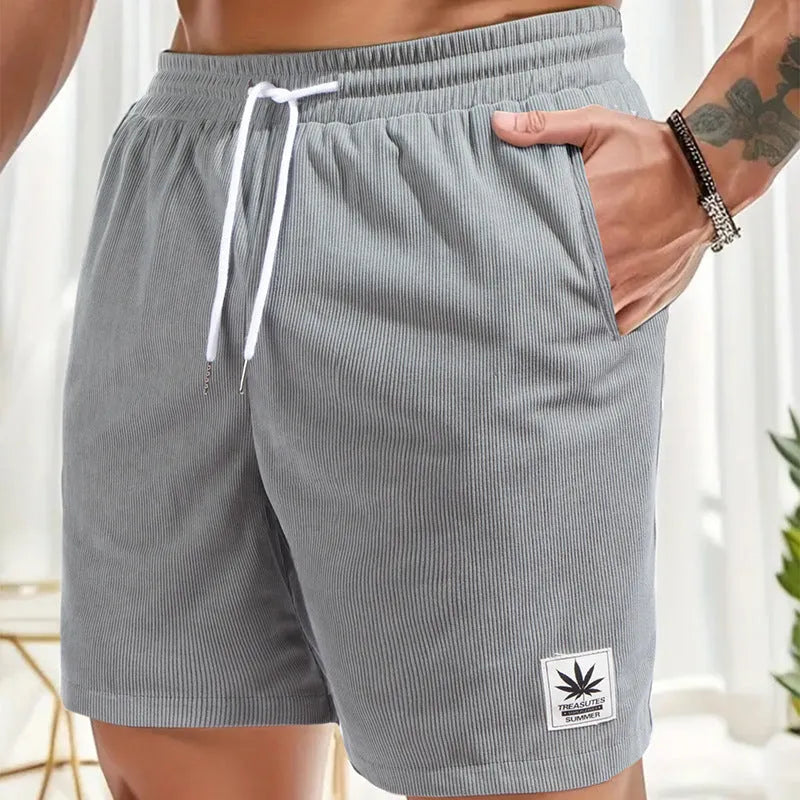 Men's black drawstring summer shorts with straight legs and micro-elastic polyester fabric