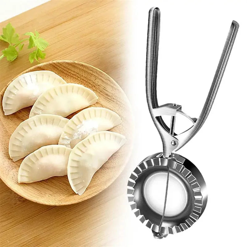 Silver stainless steel manual dumpling maker tool for pressing homemade dumplings.