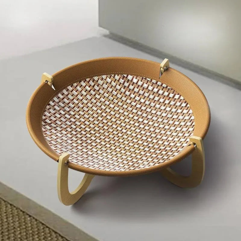 Brown woven rattan pet hammock measuring 46cm square with open weave design