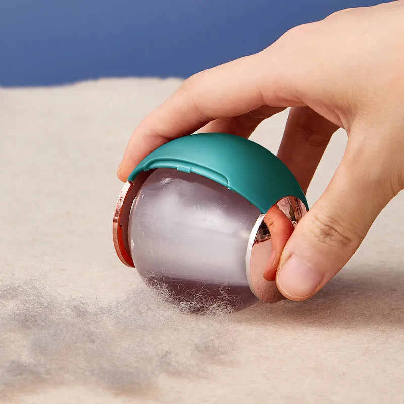Green gold reusable gel lint roller ball for removing pet hair from clothing and fabrics