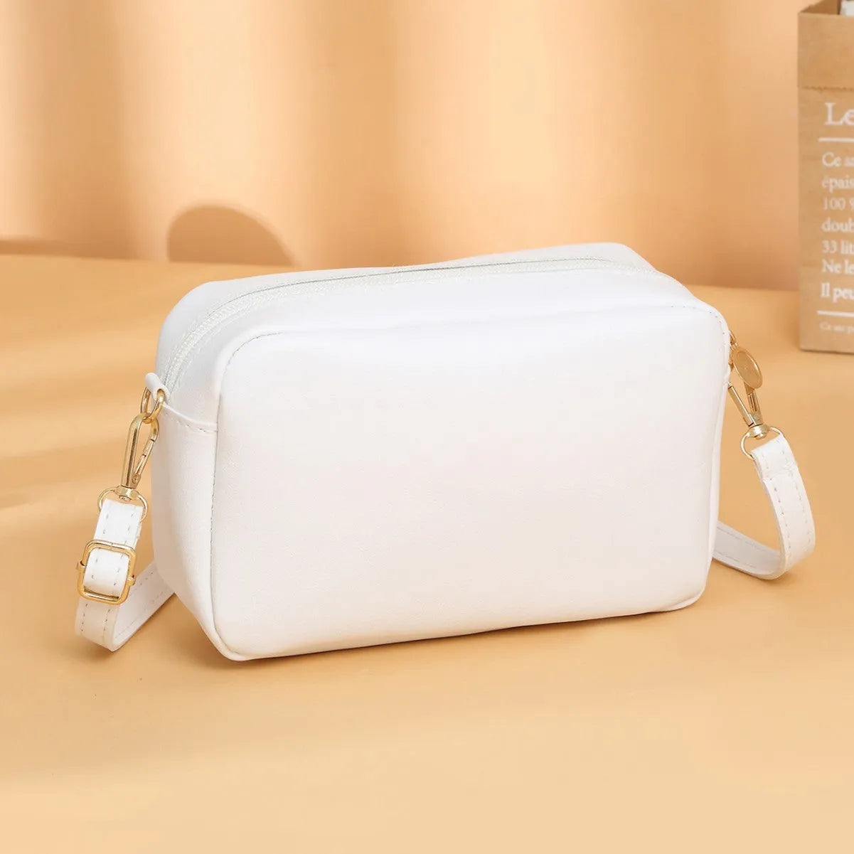 Women's solid colour PU shoulder bag with three-dimensional pocket and horizontal square shape