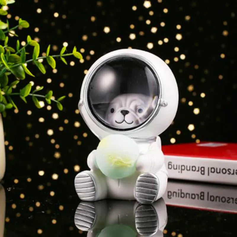 Animal-themed resin night light projecting starry sky lighting effect on surface
