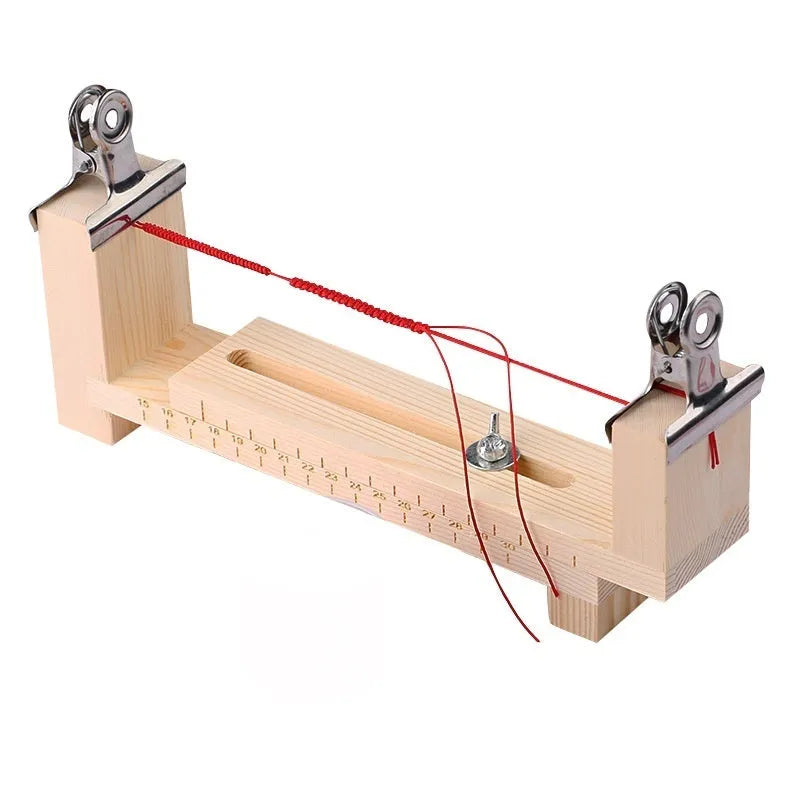 Solid wood handmade weaving machine rack with totem pattern, shown with weaving clips.