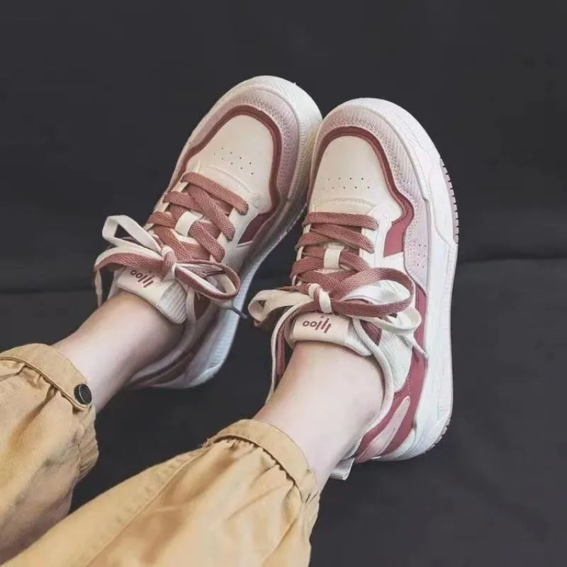 Women's pink spring sneakers with low top design and rubber sole