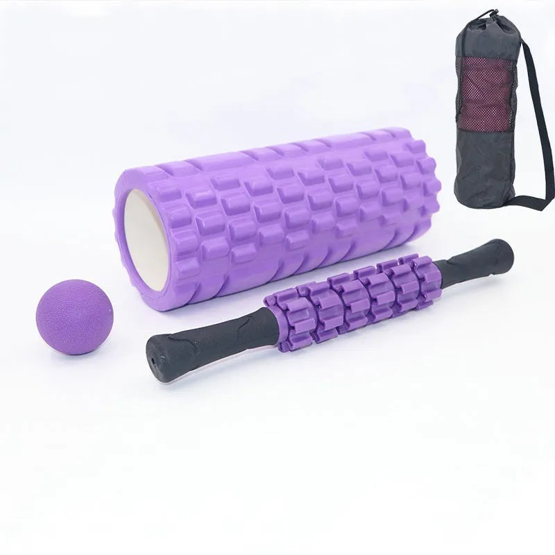 33cm black fitness foam roller massage stick on a plain background.