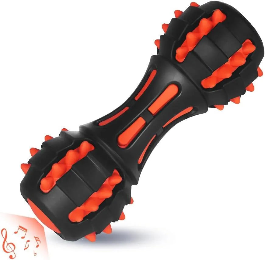 Red dumbbell-shaped natural rubber dog chew toy with squeaker for medium and large breeds