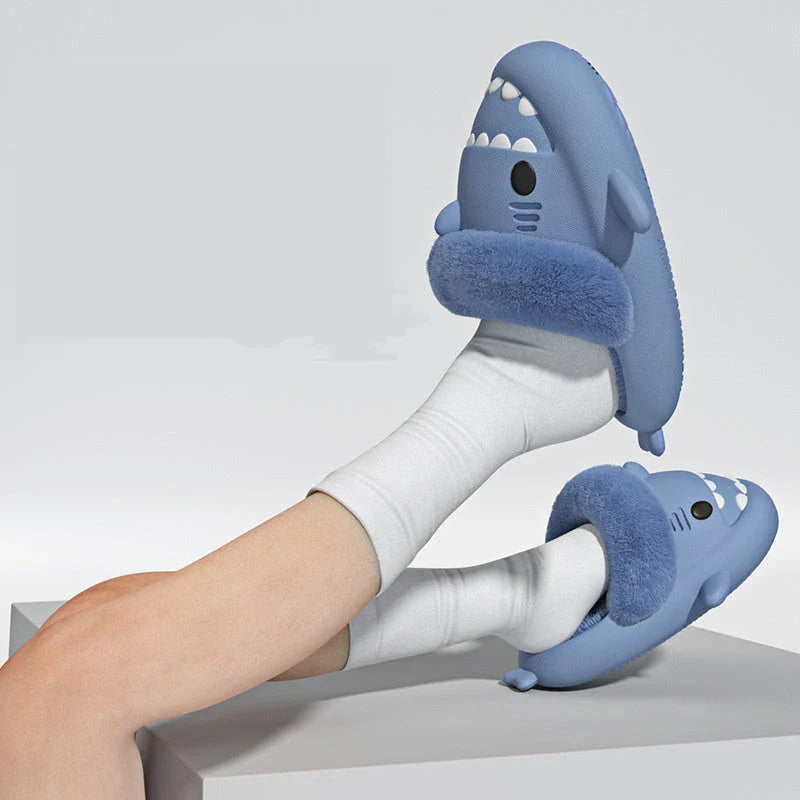 Cozy and stylish shark-themed slippers with plush, fuzzy interior and durable, non-slip outsole for comfortable indoor and outdoor use