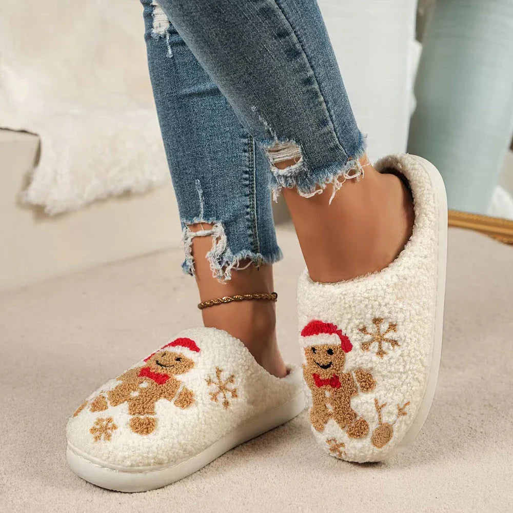 Cozy and stylish gingerbread and snowflake slippers with a plush, fuzzy exterior and non-slip sole for indoor wear