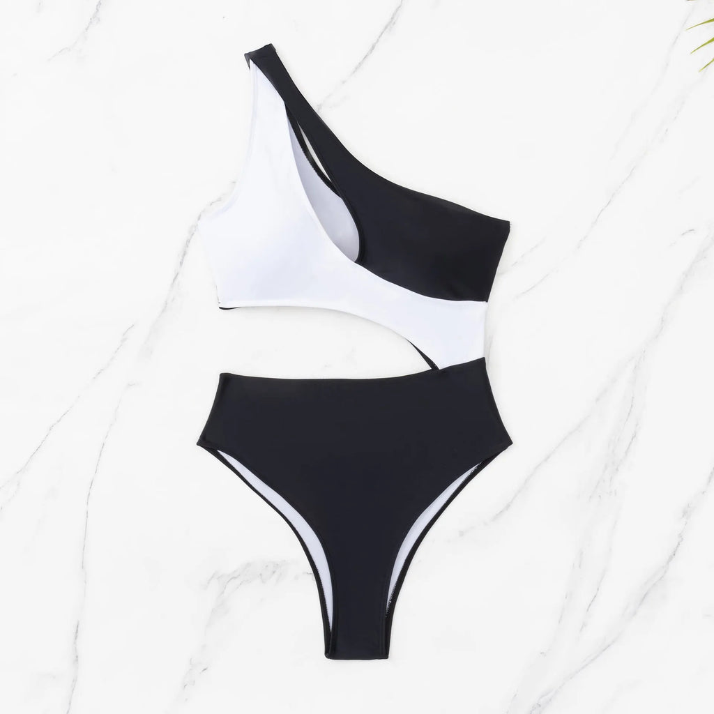 Black women's one-piece swimsuit with hollow cut-outs and white contrast stitching.