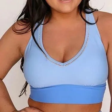 Women's conservative blue polyester one piece split swimsuit with vest top and full coverage