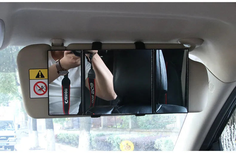 Silver car folding makeup mirror shown open and closed with dimensions