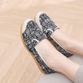 Women's ethnic style cloth shoes with flat heel, colour stitching, and shallow mouth opening