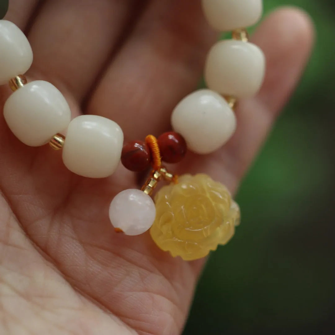 Woven gradient white jade Bodhi bracelet with beeswax lotus charm, 10mm beads, retro flower design