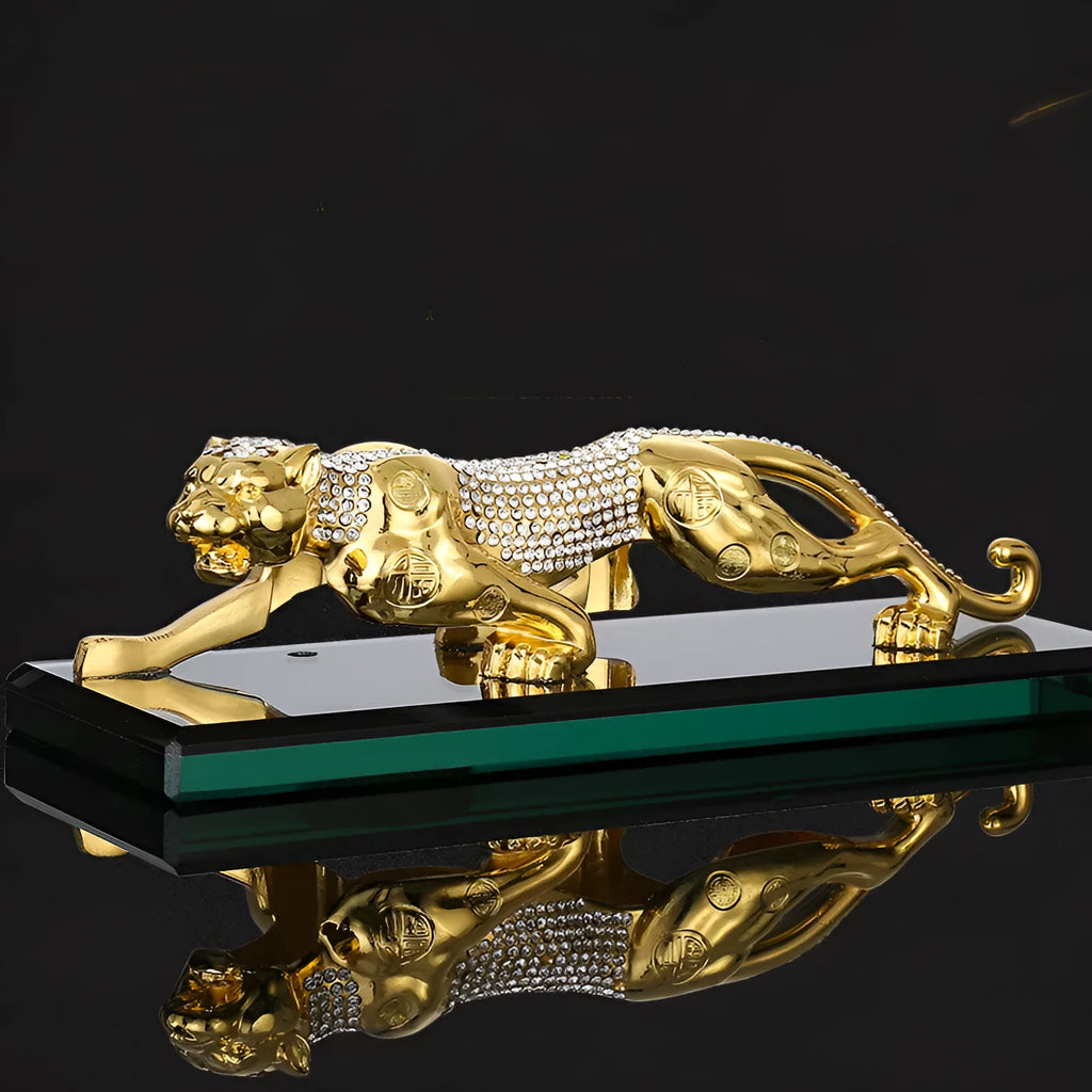 Leopard car perfume ornament made of alloy crystal base plate and resin in gold finish on car dashboard