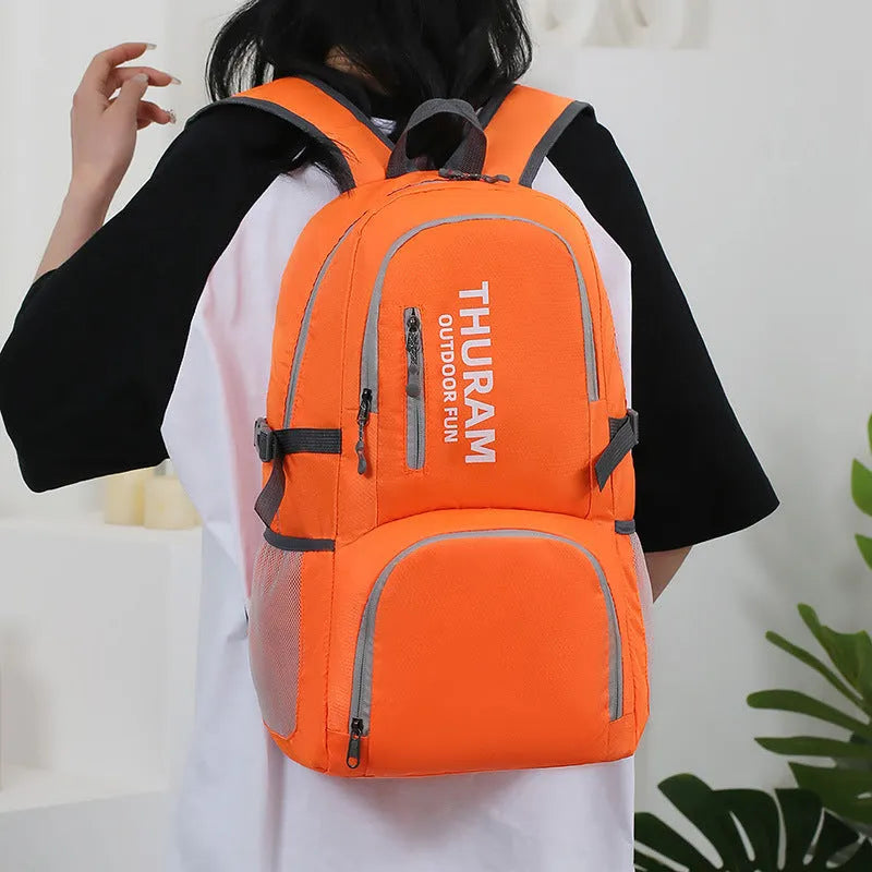 Outdoor backpack in dark blue with air-cushioned shoulder straps and large main compartment