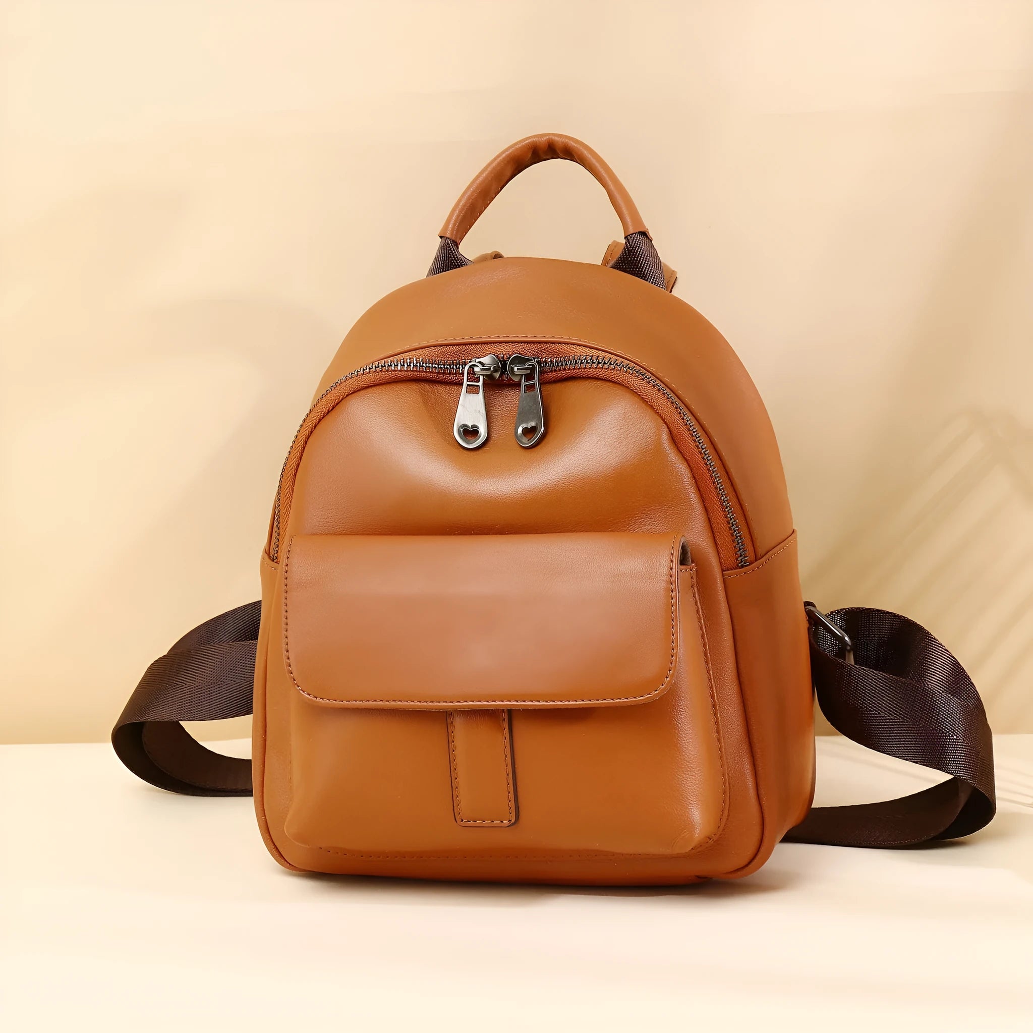 First layer cowhide leather women backpack in compact 24x20x10cm size, available in black, brown, or coffee