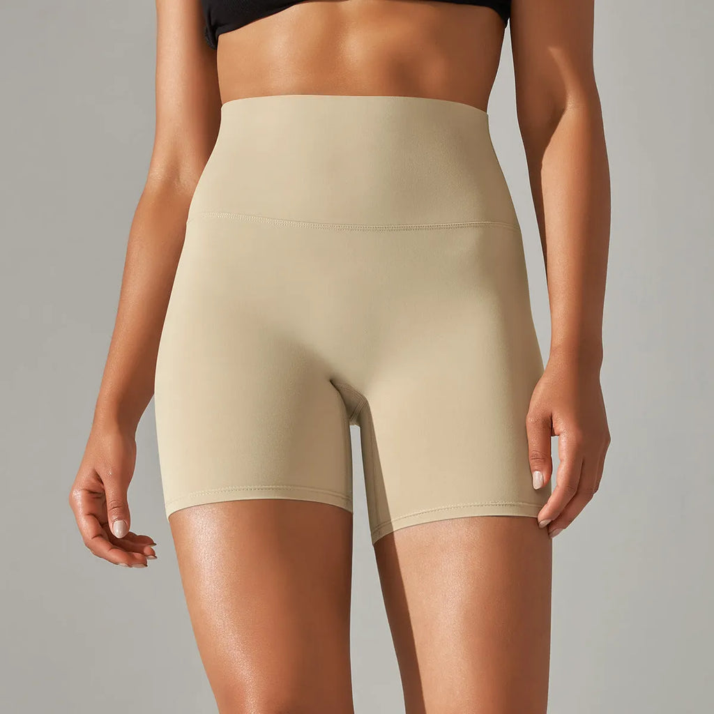 Women's high waist fitness tights in dark green for belly control and hip lift during exercise