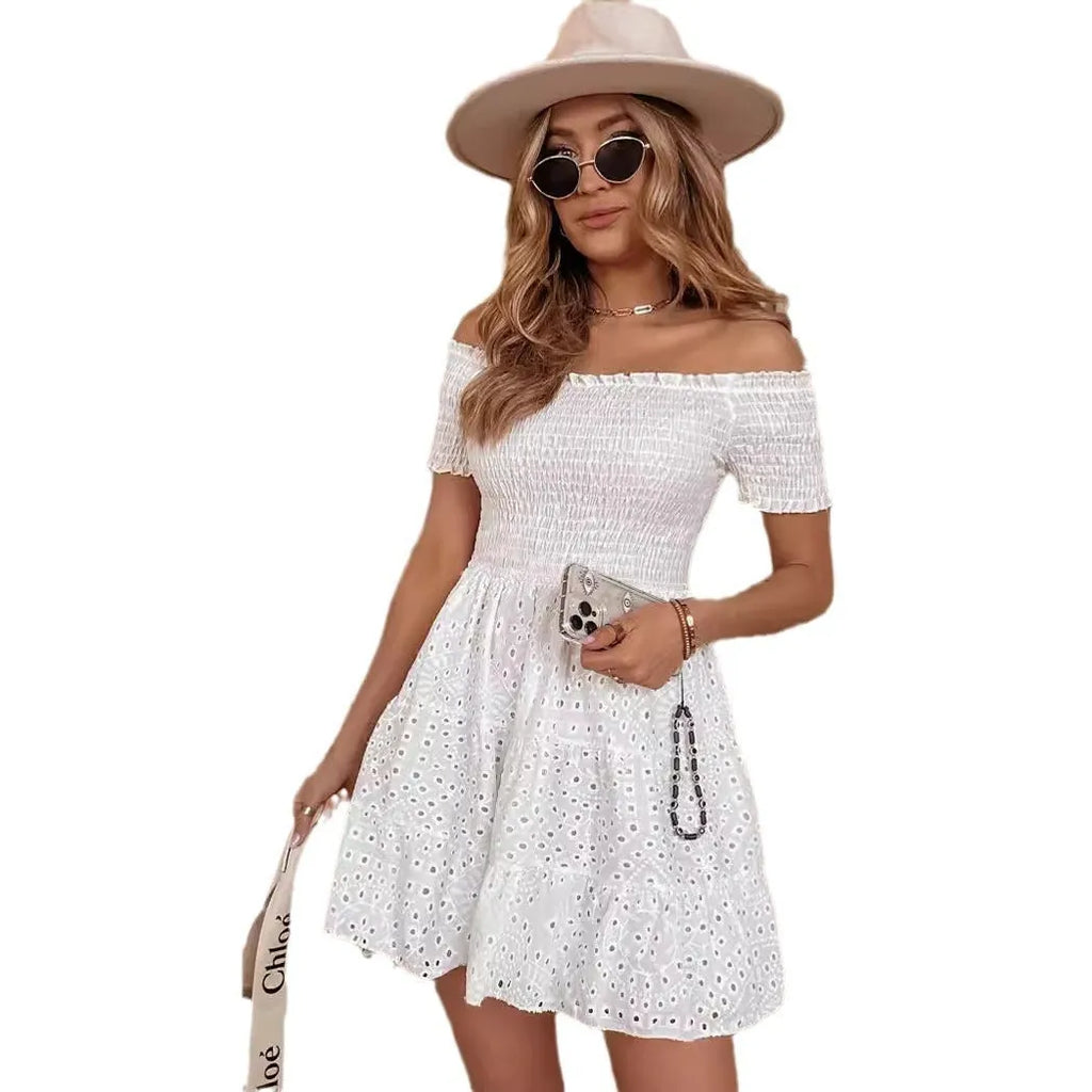 White one-shoulder A-line dress with embroidery, hollow out detail, high waist, short sleeve, and short skirt