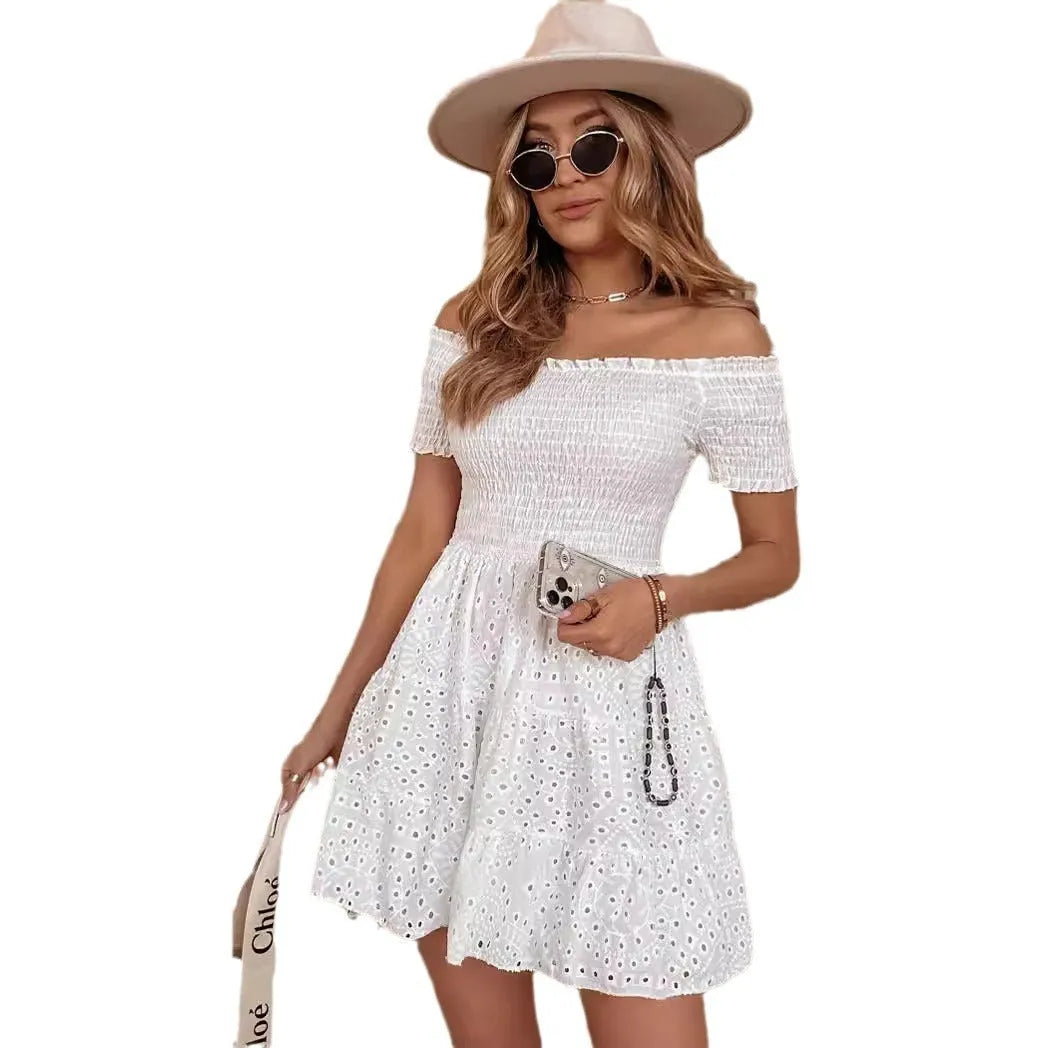 White one-shoulder A-line dress with embroidery, hollow out detail, high waist, short sleeve, and short skirt