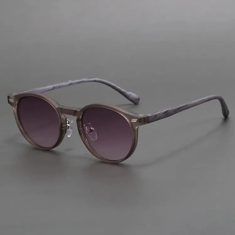 Retro frosted round rim sunglasses in multiple colour options for UV protection.