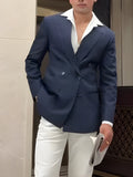 Men's striped double-breasted blazer on hanger showing regular length and structured front
