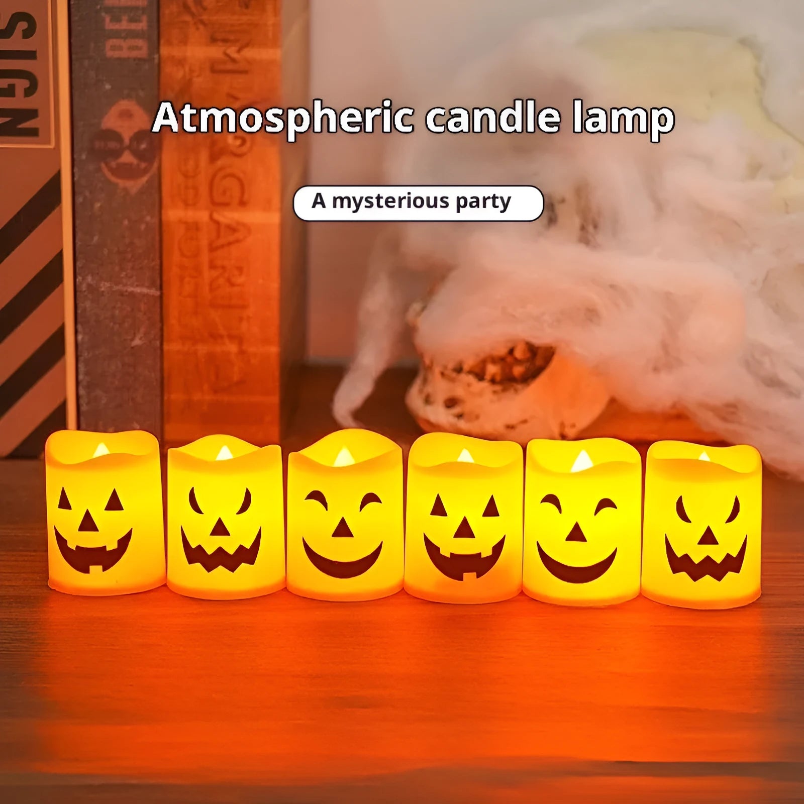 Set of six pumpkin-coloured plastic electric candle lamps arranged for Halloween decoration