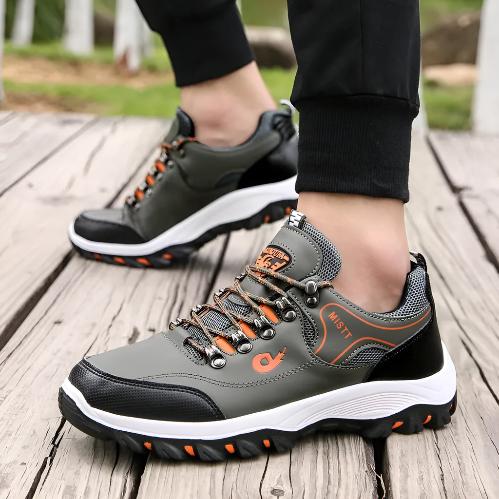 Men's outdoor hiking shoes in black with non-slip rubber outsole and lace-up closure