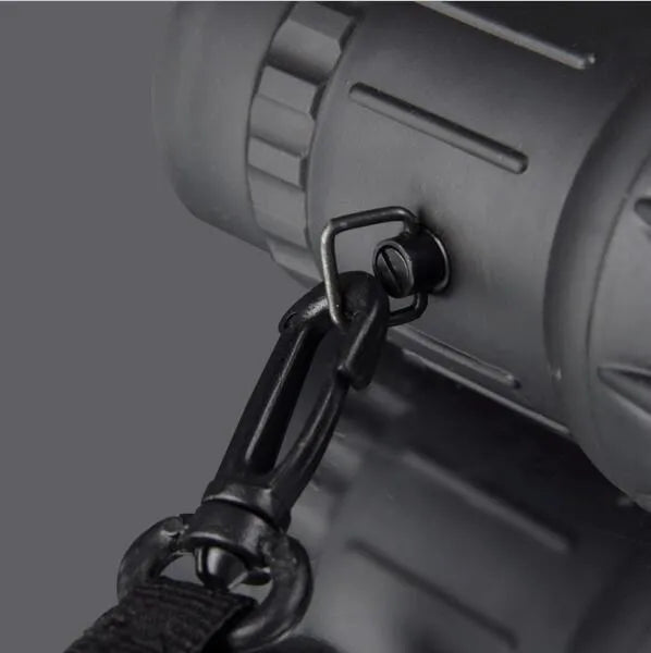Black 16x52 high-power monocular telescope with wide-angle lens and eyepiece adjustment focus ring.