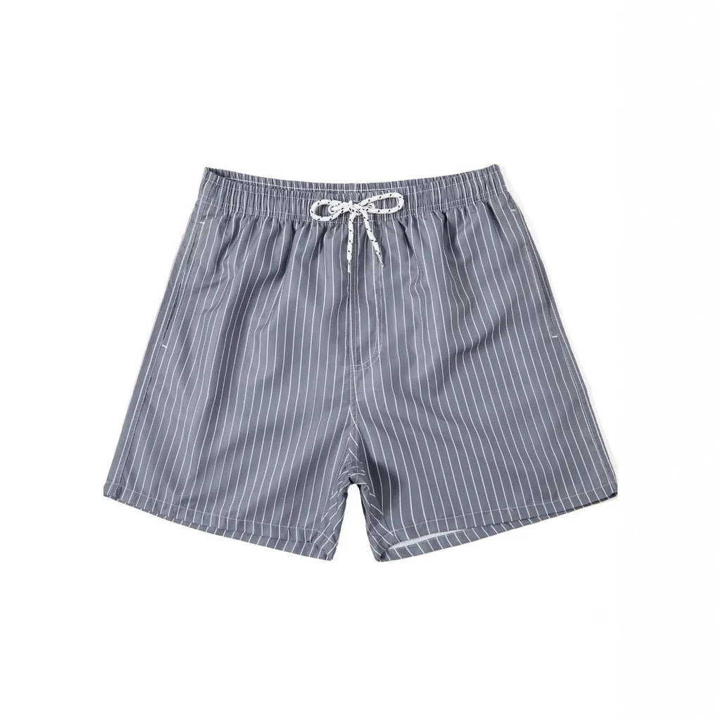 Men's polyester beach shorts with striped triangle pattern in navy blue colour showing straight leg opening