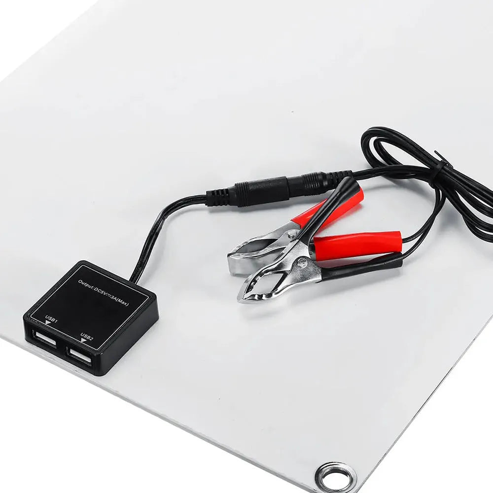 Black semi-flexible 30W solar panel showing USB charging port for outdoor use.