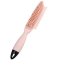 Green pet grooming brush with rubber handle and flexible bristles for removing hair from dogs, cats and clothing