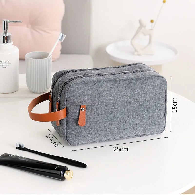 Men's polyester toiletry bag with sealed closure in gray colour, 25x15x10cm size for travel storage