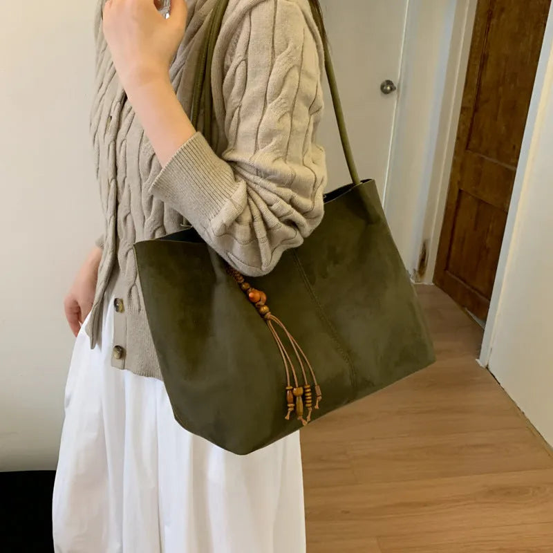 Large capacity suede tote bag in horizontal square shape with single shoulder strap, available in green with matching pendant