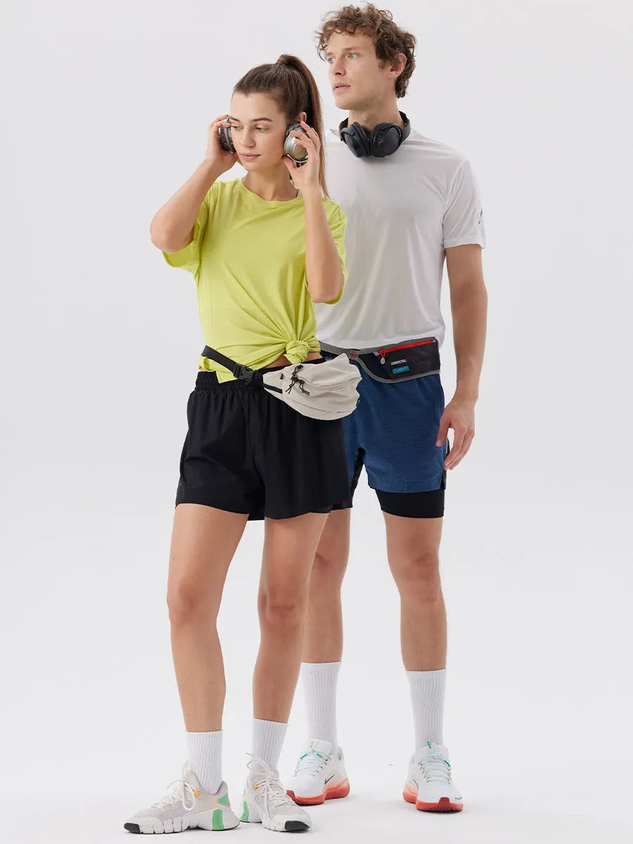 Men's straight-leg nylon sports shorts in black with side slits on leg.