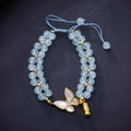 Handmade women's woven bracelet with 6mm aquamarine beads and butterfly decoration in retro style