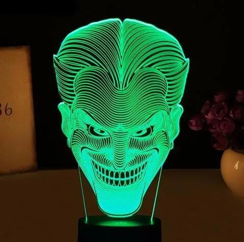 USB-powered 3D LED table lamp with remote control showing multiple colour options