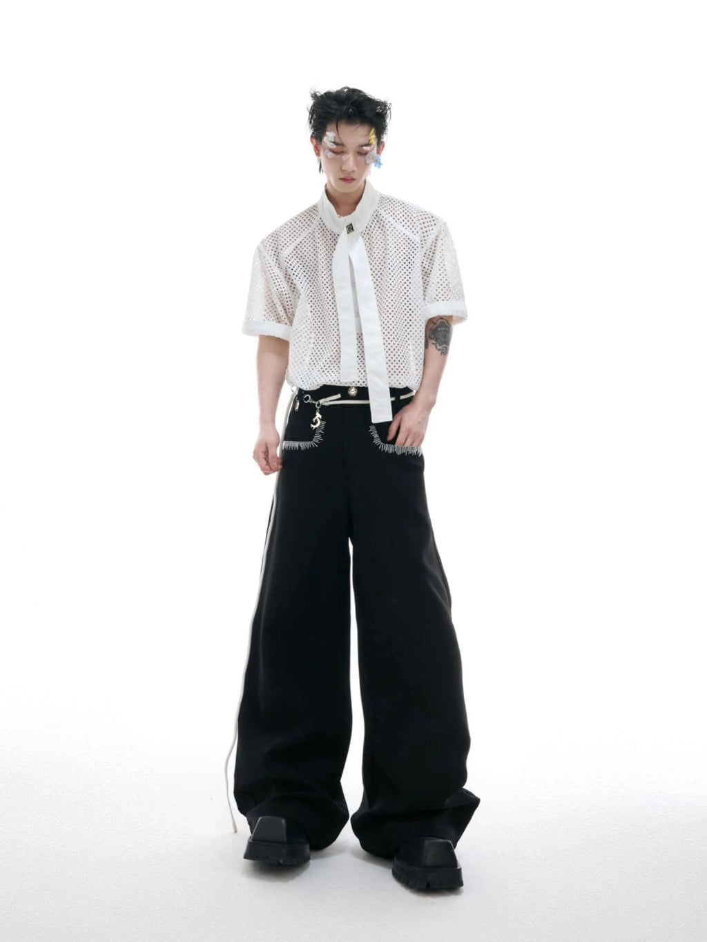 Men's short sleeve T-shirt with tie stitching and metal tassel, loose fit, available in black, white, and blue.