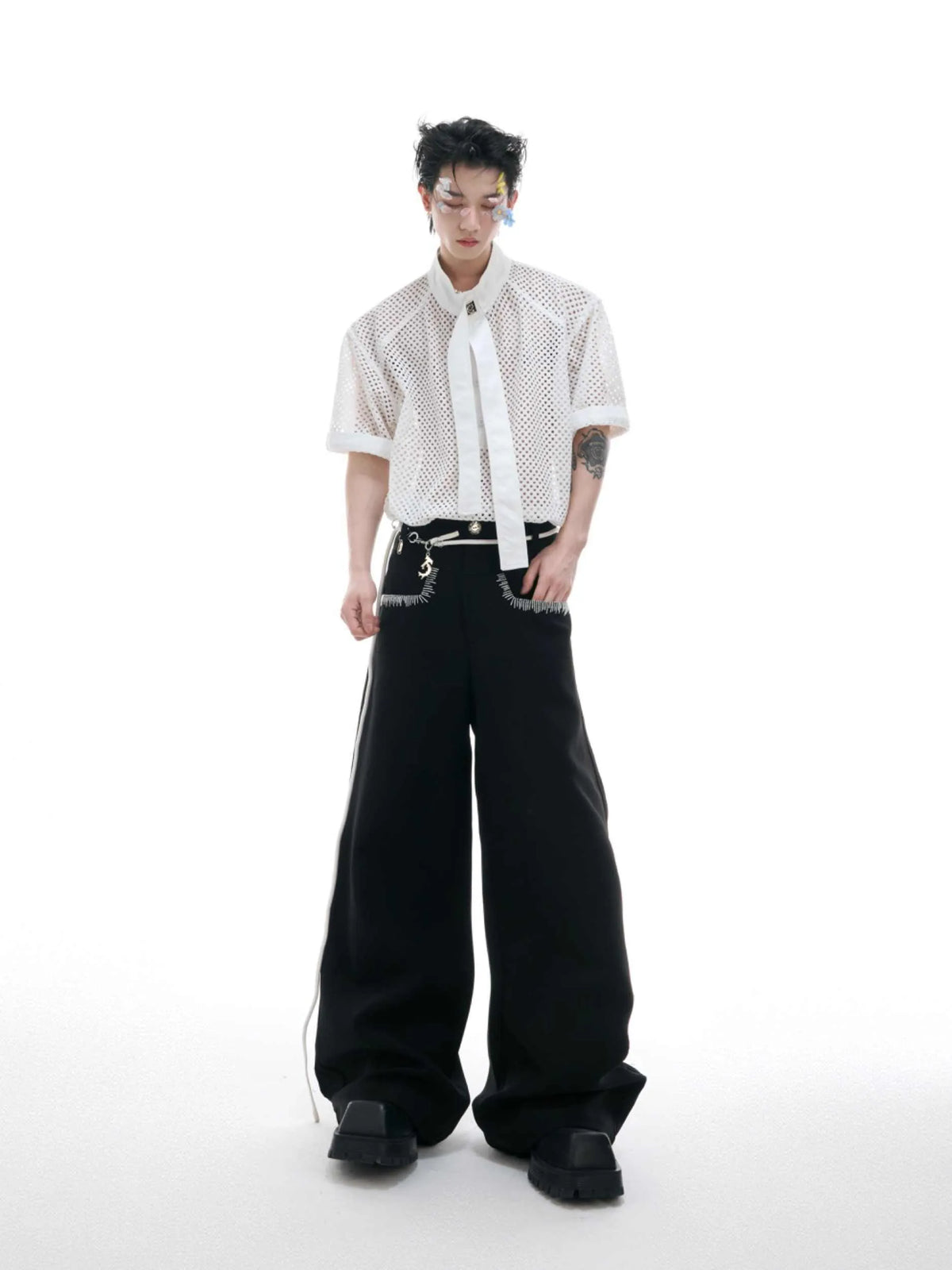 Men's short sleeve T-shirt with tie stitching and metal tassel, loose fit, available in black, white, and blue.