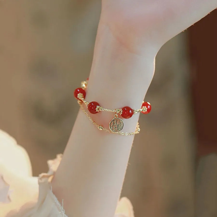 Red Agate Hongma blessing card double-layer charm bracelet for women in a gift box.