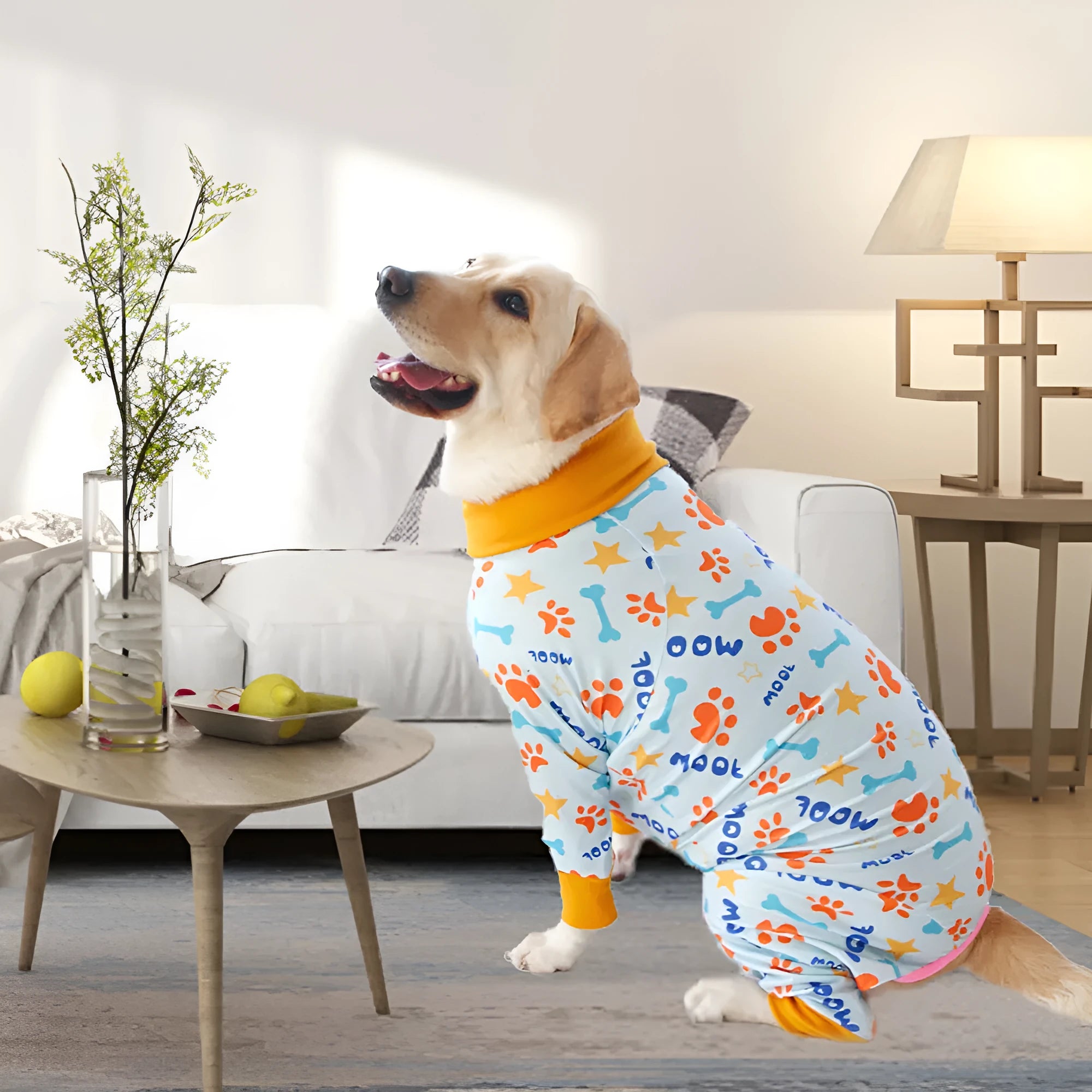 Cotton dog jumpsuit with cartoon print on small dog showing full-body coverage
