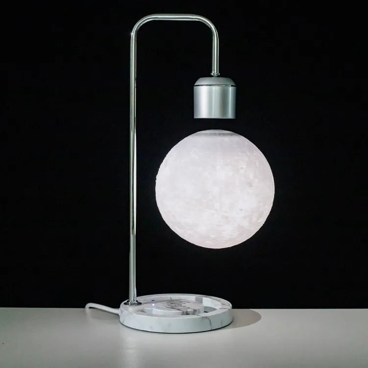 Magnetic levitation table lamp with wooden base, floating light, and optional wireless charger in colour A