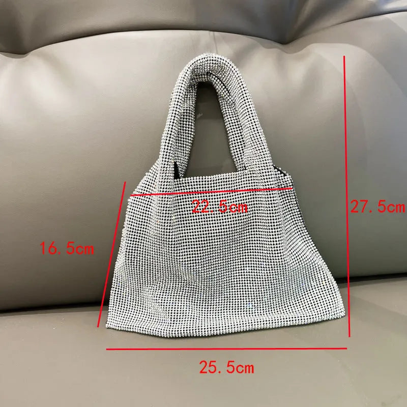 Silver handbag with shiny rhinestone decoration and open pocket design
