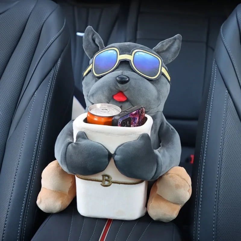 Plush car tissue box holder hanging in flip armrest compartment with dog character design