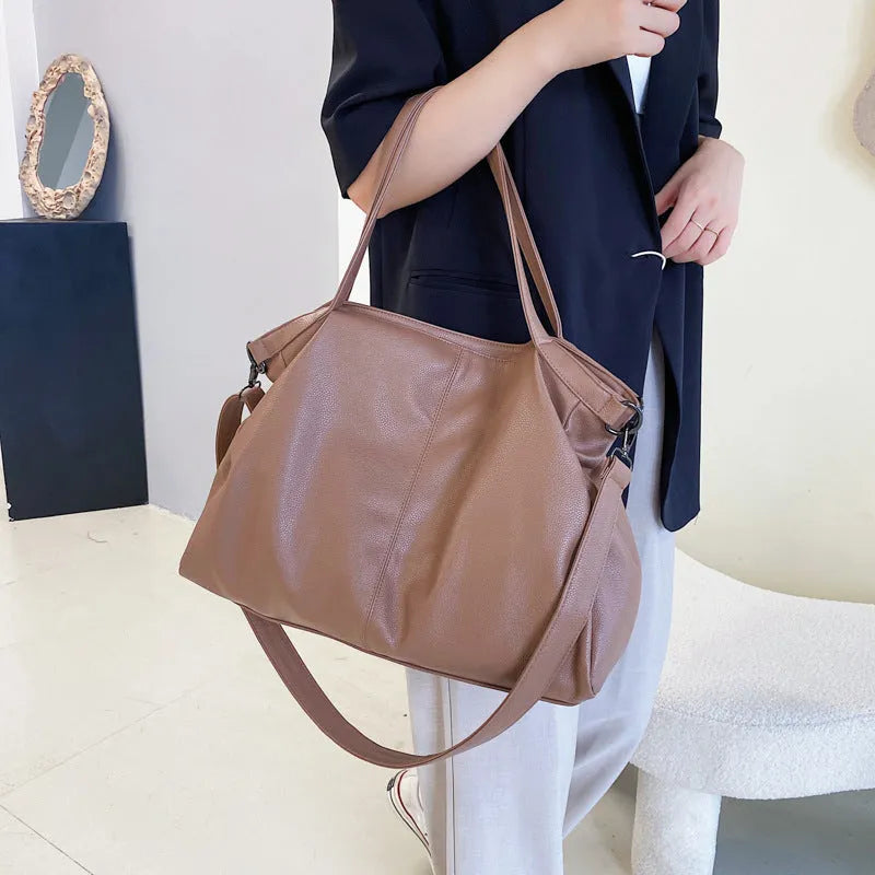 Large soft surface PU messenger tote bag with adjustable shoulder strap and zip opening